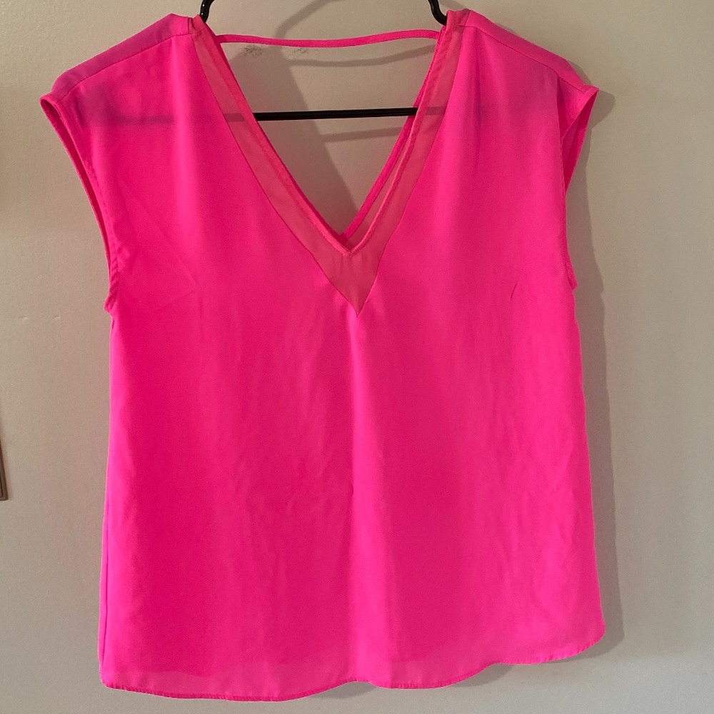 Pink sleeveless blouse
